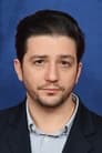 John Magaro isOwen Taylor